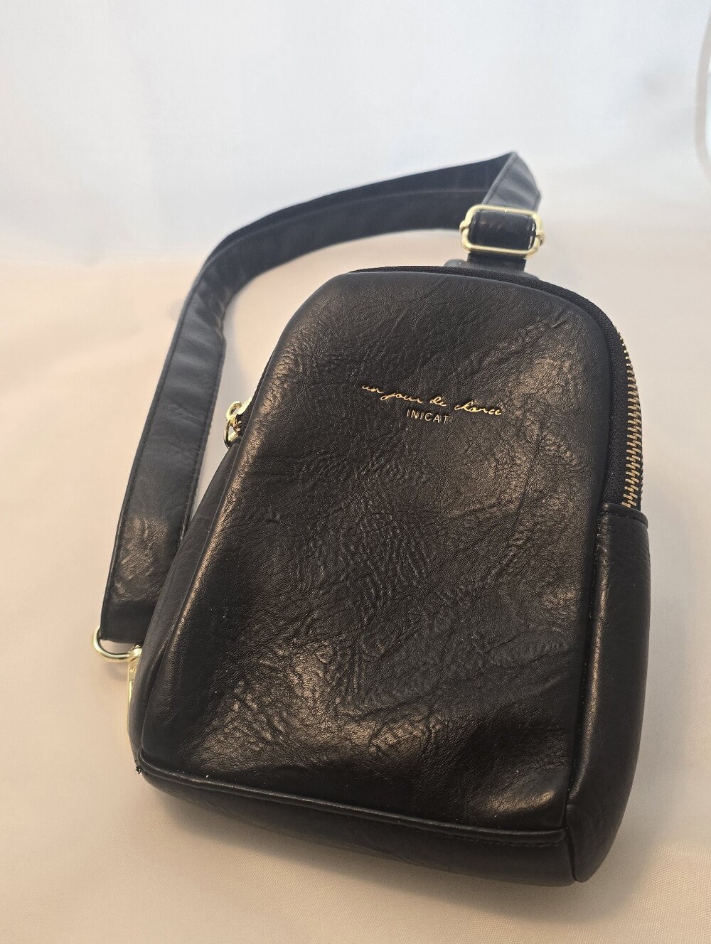 INICAT Black Faux-Leather Crossbody Sling Bag with Gold Accents